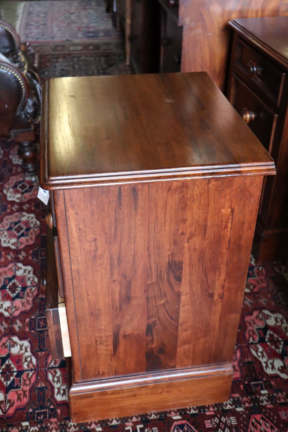 A pair of Willis & Gambier walnut three drawer bedside chests, width 50cm depth 40cm height 66cm